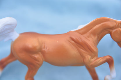 Palomino Galloping Arabian Stallion